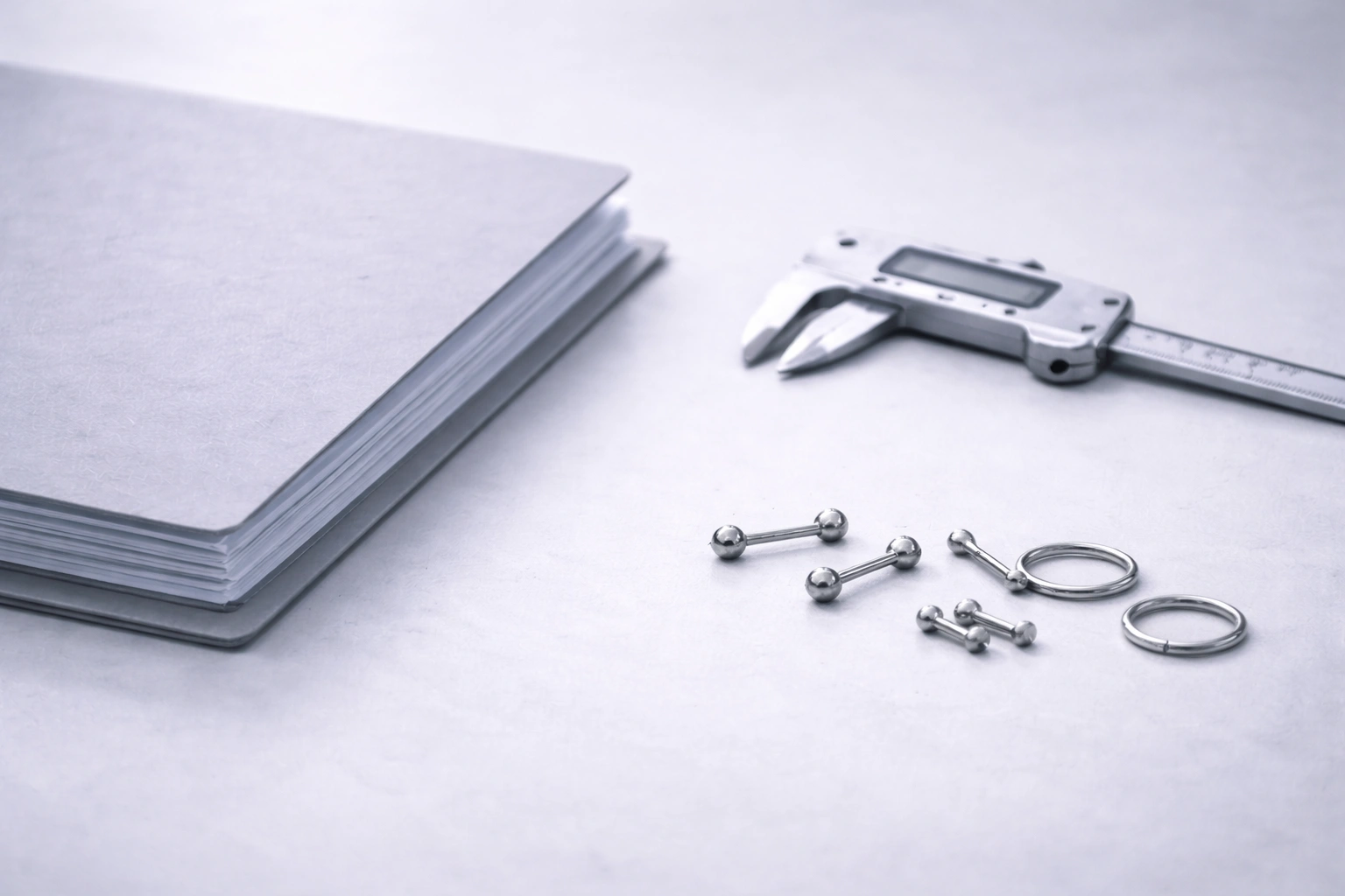 Technical specification handbook with caliper and titanium components
